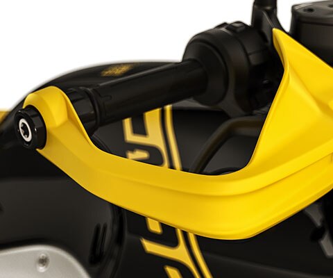 We see the yellow hand protector of the R nineT Urban G/S.